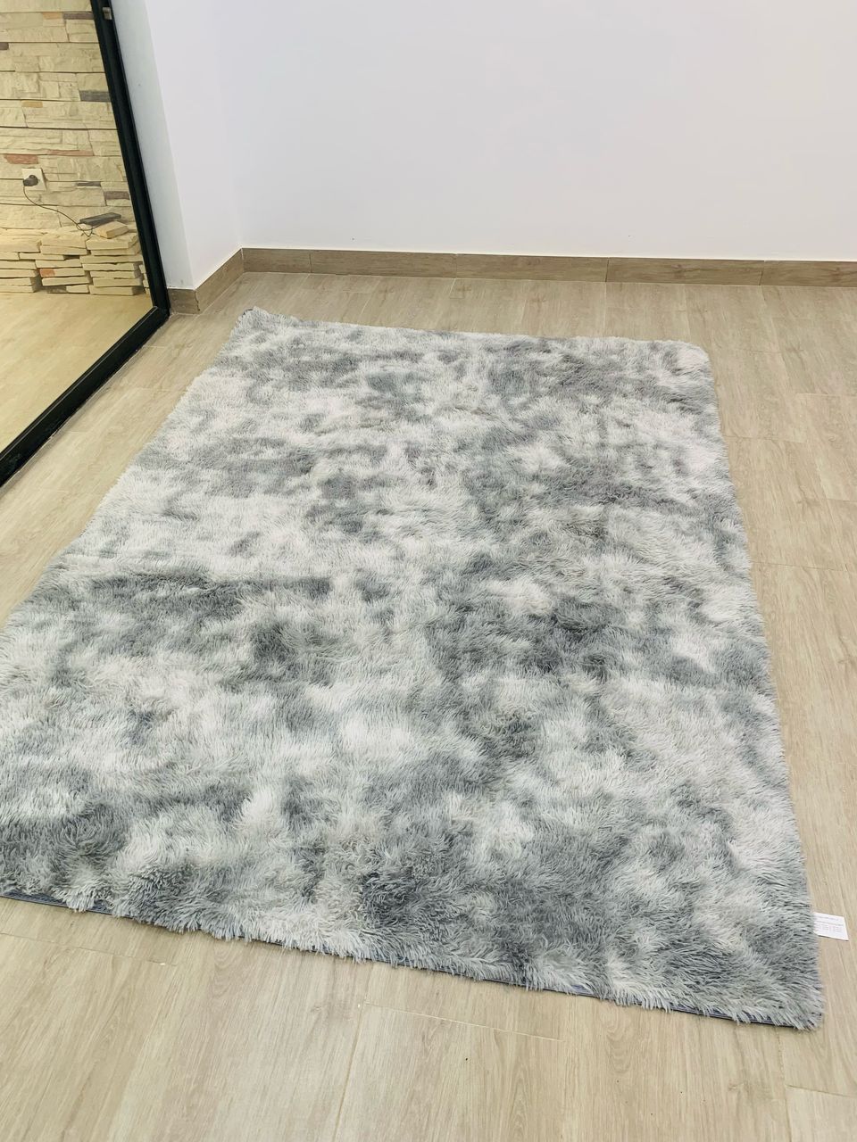 Tapis fourrure 100 %.